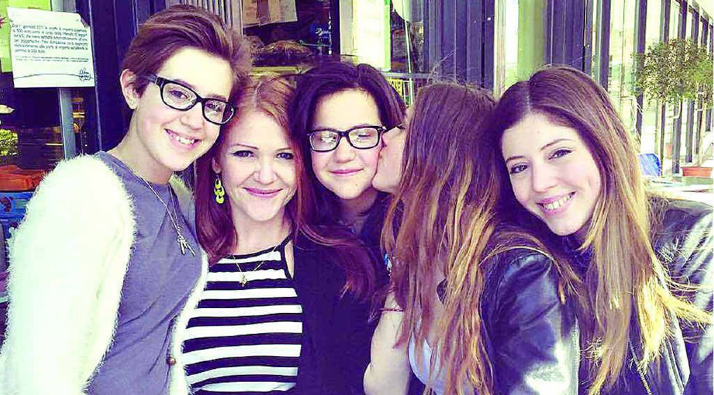 REUNION: The four sisters, Lily, Christine, Emily and Claire with their mother in Italy. REUNION: The four sisters, Lily, Christine, Emily and Claire with their mother in Italy.